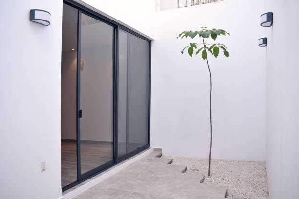istock Patio with window and minimalist garden 1833911199