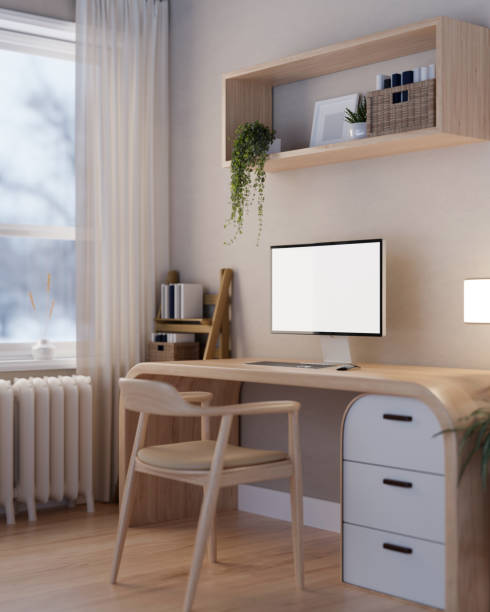 istock A beautiful Scandinavian home office workspace with an empty desktop PC computer on a wooden desk. 1834018371