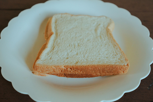 White bread placed on a plate for breakfast