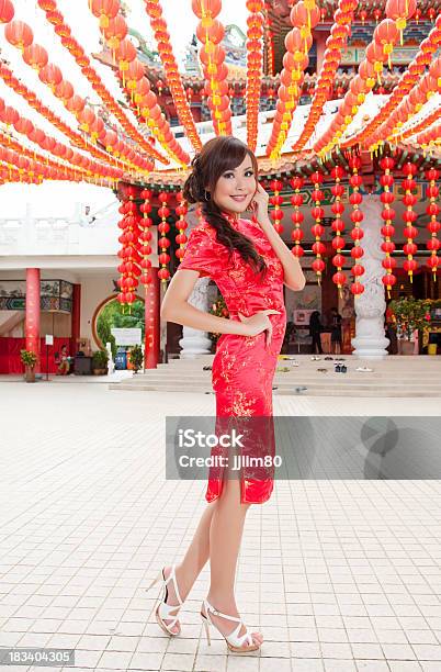 Beautiful Asian Chinese Lady In Red Cheongsam Stock Photo - Download Image Now - Adulation, Adult, Asian Culture