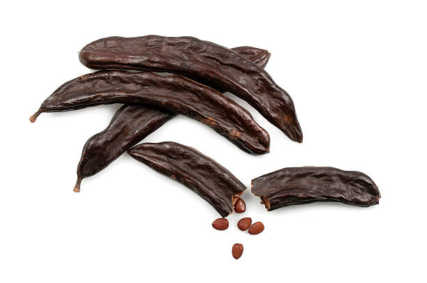 熟したキャロブ - carob bean ストックフォトと画像