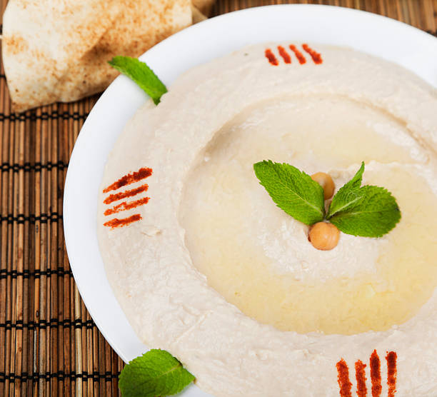 istock Fresh humus salad with menthe and nuts 183405312