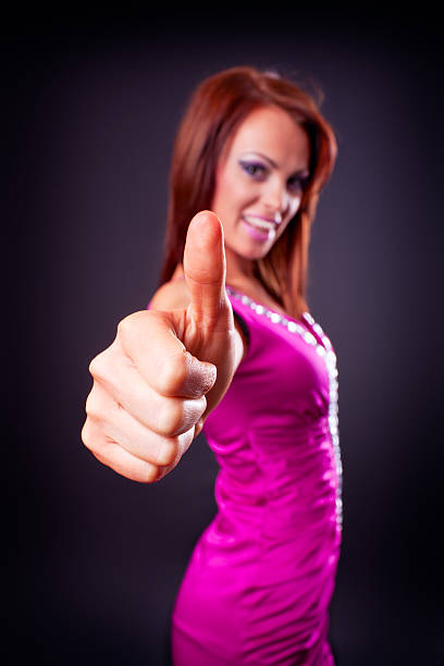 istock woman with thumb up 183405698