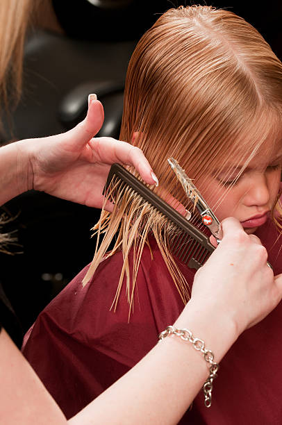 istock Little girl's haircut 183405704