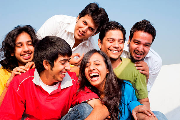 istock Six Cheerful Excited Indian Friends Having a Fun Time 183405725