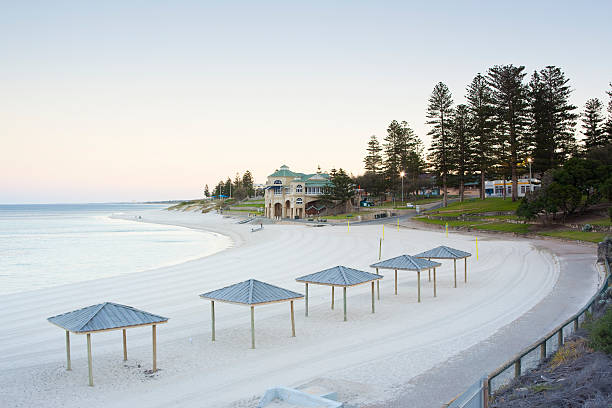 Cottesloe Beach "A mid summer dawn at Cottesloe Beach one of the most beautiful and busiest beaches in Perth, Western Australia" cottesloe stock pictures, royalty-free photos & images