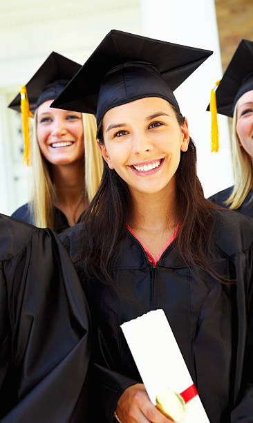 istock Young girl attending graduation ceremony 183407566