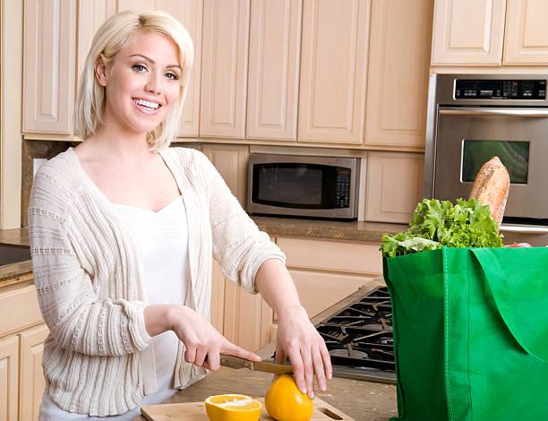 istock Young Woman Preparing Food 183407919