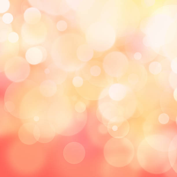 istock A pink and yellow bokeh effect background 183409374