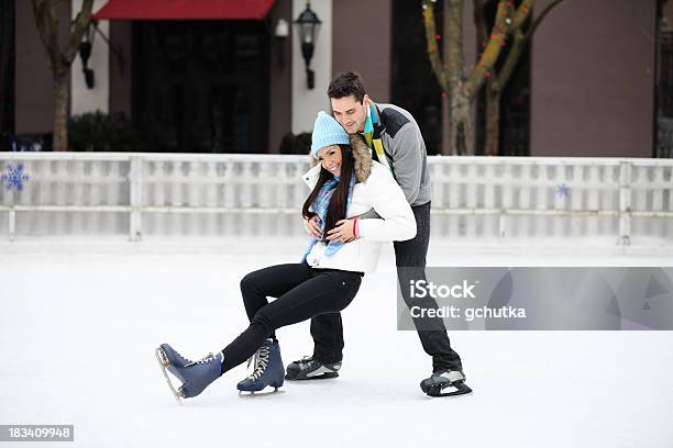 Falling On Ice Skates Stock Photo - Download Image Now - 20-29 Years, Activity, Adult