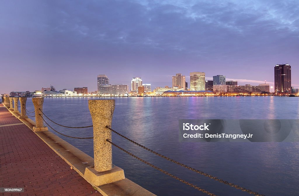 Norfolk Virginia Skyline Norfolk Virginia downtown skyline on the banks of Chesapeake Bay. Norfolk is an independent city in the Commonwealth of Virginia in the United States. Norfolk is in the metro area called Hampton Roads. Norfolk is known for its coffee houses and breweries, world’s largest Naval base, museums, and beaches Chesapeake Bay Stock Photo