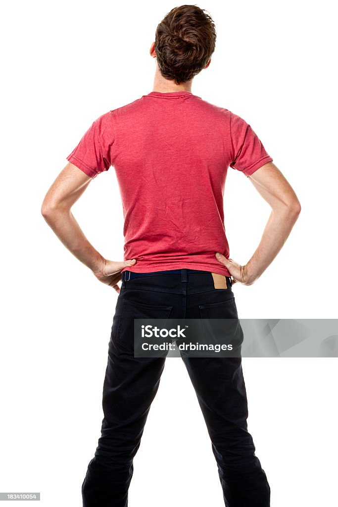 Vue arrière du jeune homme avec les mains sur les hanches - Photo de Vue de dos libre de droits