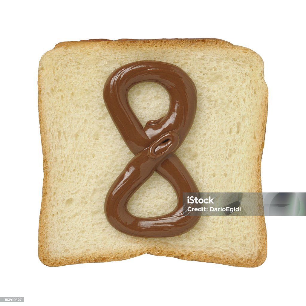 Chocolate number 8 on a tinloaf slice, white background  Bread Stock Photo