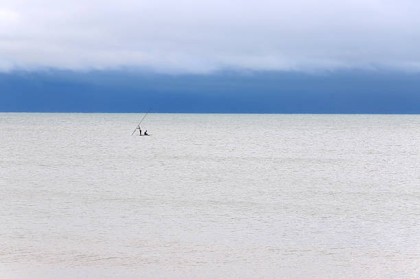 istock Pititinga (RN, Brazil) Raft and fishers on the sea 183410864