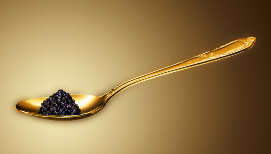 caviar on golden spoon