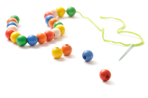 Chain toy made from colored wooden beads