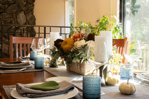 Festive Thanksgiving tablescape, with candles and flowers. in Washington, District of Columbia, United States