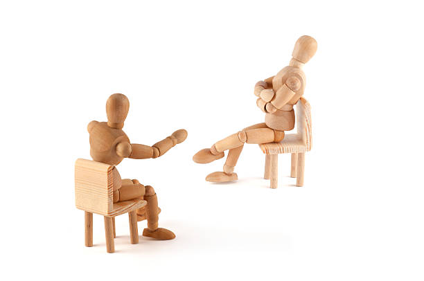 istock wooden mannequin in discussion 183413817
