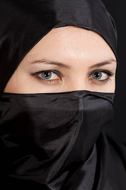 istock Blue Eyes: Beautiful women wearing a Hijab 183414245