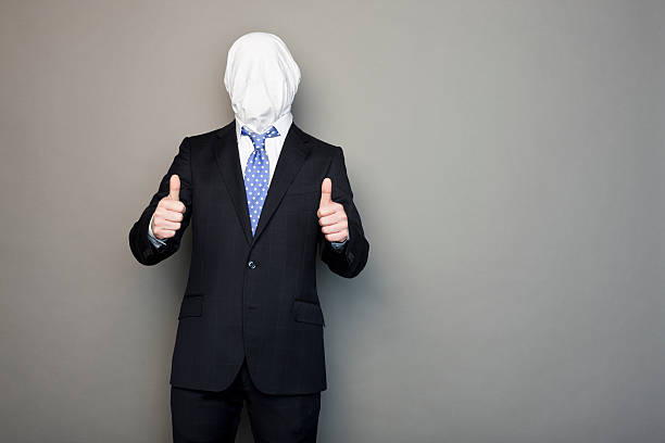 istock portrait of a faceless optimistic man 183414681