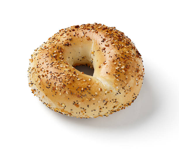 istock Bagel with sesame and poppy seeds on white background 183414796