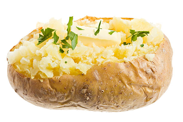 istock Parsley and Butter On a Freshly Baked Potato 183414992
