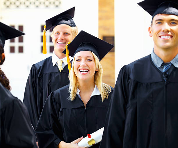 istock Group of graduate students looking happy 183415448