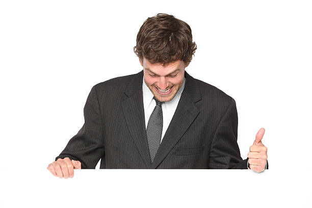 istock Businessman looking at a placard 183415509