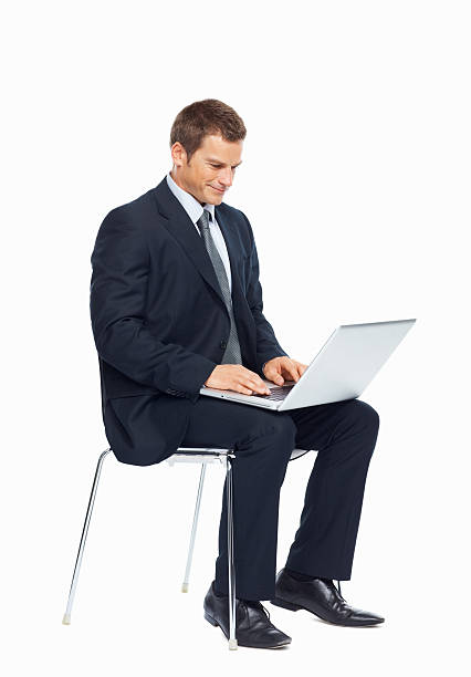 istock Businessman sitting on a chair and working 183415696