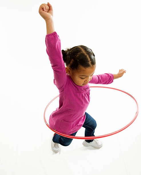 istock Smiling Young Girl with Hulahoop 183415758