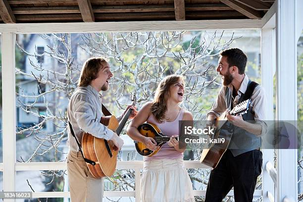 Musicians Singing And Playing Instruments Stock Photo - Download Image Now - Country and Western Music, Performance Group, Banjo