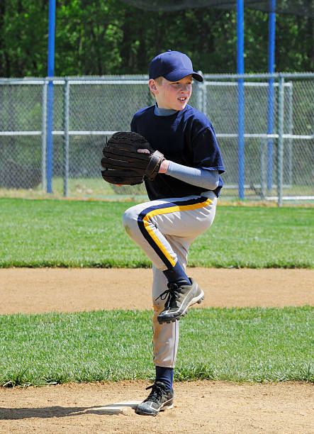 istock Young Male Boy Baseball Player Pitching on Pitcher's Mound 183416728