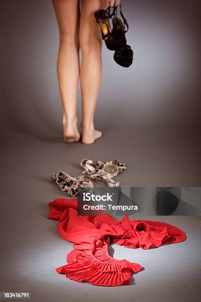 Taking Off The Red Dress Stock Photo - Download Image Now - Clothing, Flooring, Adult