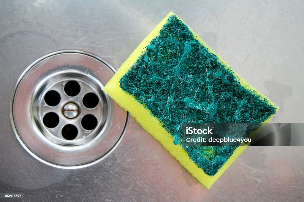 back side of a sponge after cleaning the sink "back side of a sponge after cleaning the sinkFokus is on the spongeraw workflow, low sharpening" Bath Sponge Stock Photo
