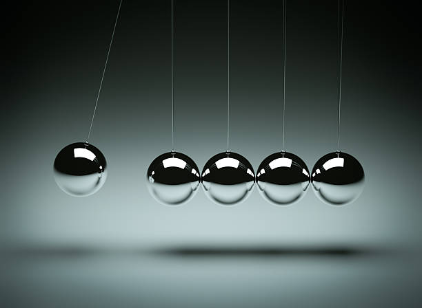 Balancing balls Newton's cradle "Balancing balls Newton's cradle, clean studio shotVector versions:" impact stock pictures, royalty-free photos & images