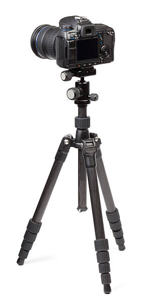 Digital camera on tripod "Digital camera on tripod. This file is cleaned, retouched and contains" tripod stock pictures, royalty-free photos & images