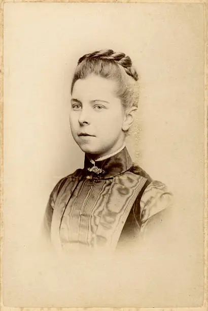 Vintage photograph of a young woman from the victorian era, circa 1870