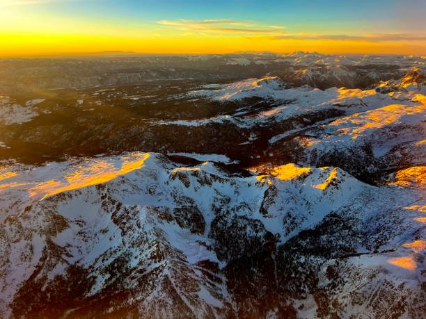 istock Flying over Snowcapped Rocky Mountains at Sunset, Colorado 1834184175