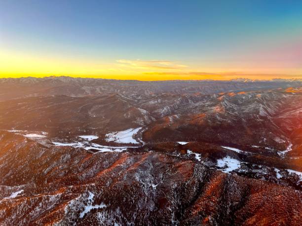 istock Flying over Snowcapped Rocky Mountains at Sunset, Colorado 1834184687