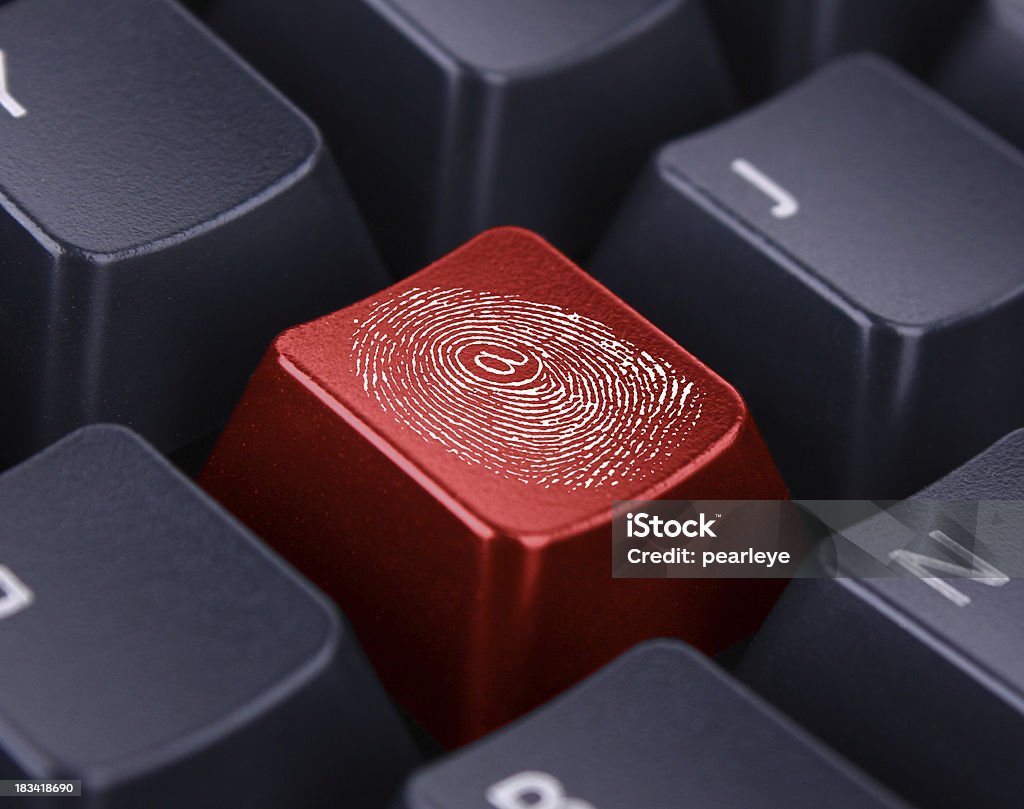 fingerprint fingerprint with @ symbol on computer key Signature Stock Photo