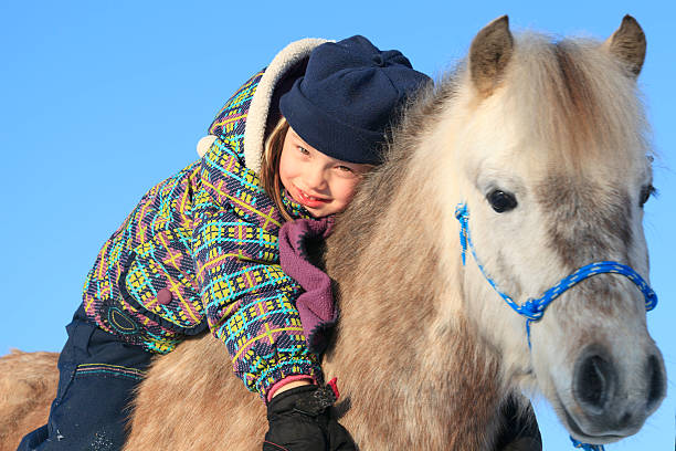 istock Little Girl Love Poney 183419403