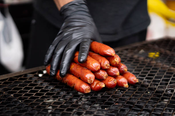 istock a man preparing a delicious Colombian chorizos 1834197117