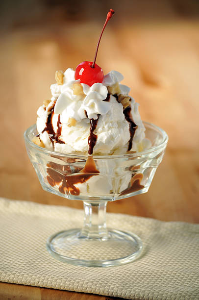 istock Delicious Hot Fudge Sundae with Nuts and Cherry on Top 183419713