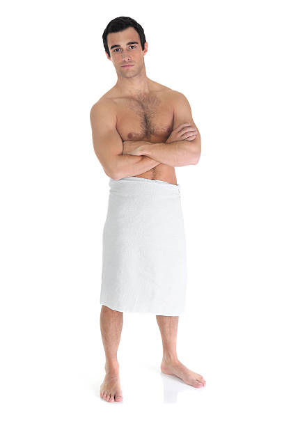 istock Man in towel standing with arms crossed 183420059