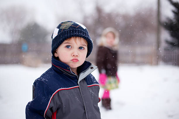 istock Little Boy in the Snow 183420225