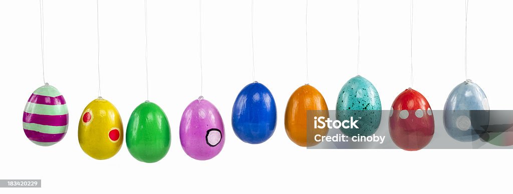 Colored Easter Eggs Easter Eggs hanging by a thread isolated on white Easter Egg Stock Photo