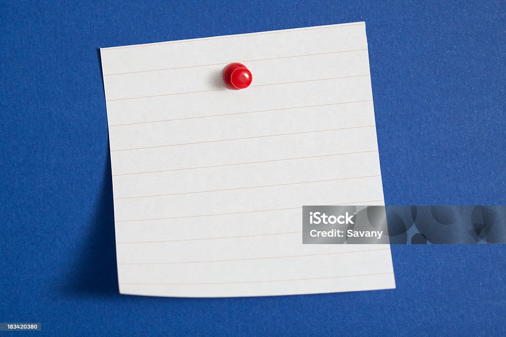 Reminder Corkboard with blank paper Blue Stock Photo