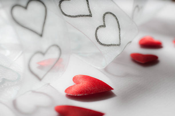 istock hearts on tulle and red ones 183420431
