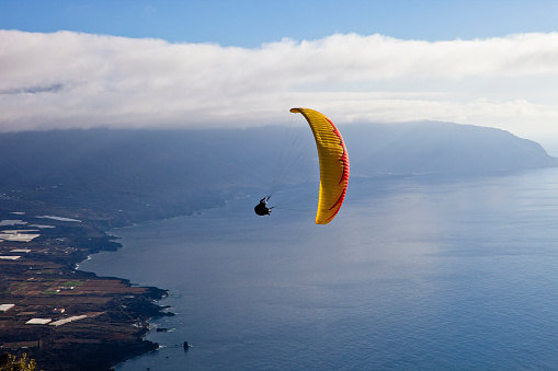 Paragliding at Mirador de la Pena, one of the most visited places on El Hierro and one of its the most scenographic landmarks. El Hierro, Canary Islands.