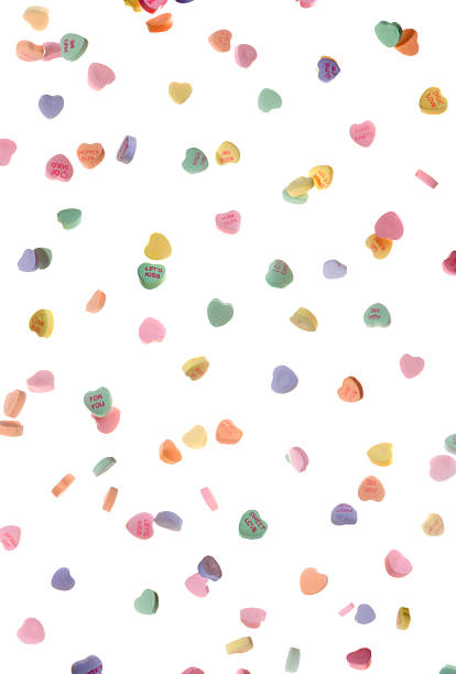 A circular arrangement of white hearts surrounding the word \